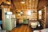 Kitchen view of log cabins.